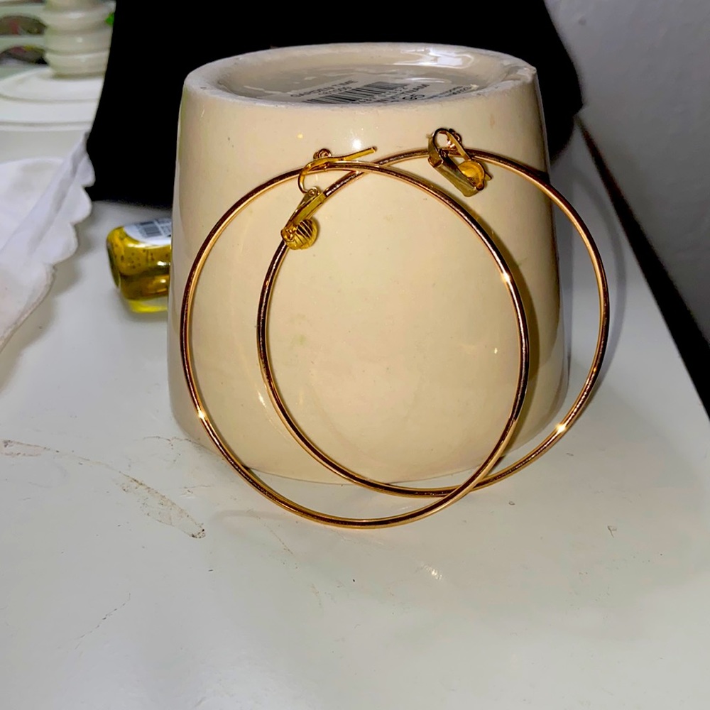 Gold tone, large hoop, clip earrings